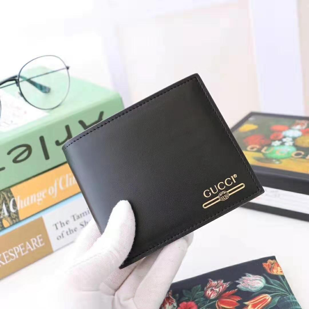 G*u*i gg unisex leather wallet with G*u*i logo in black leather