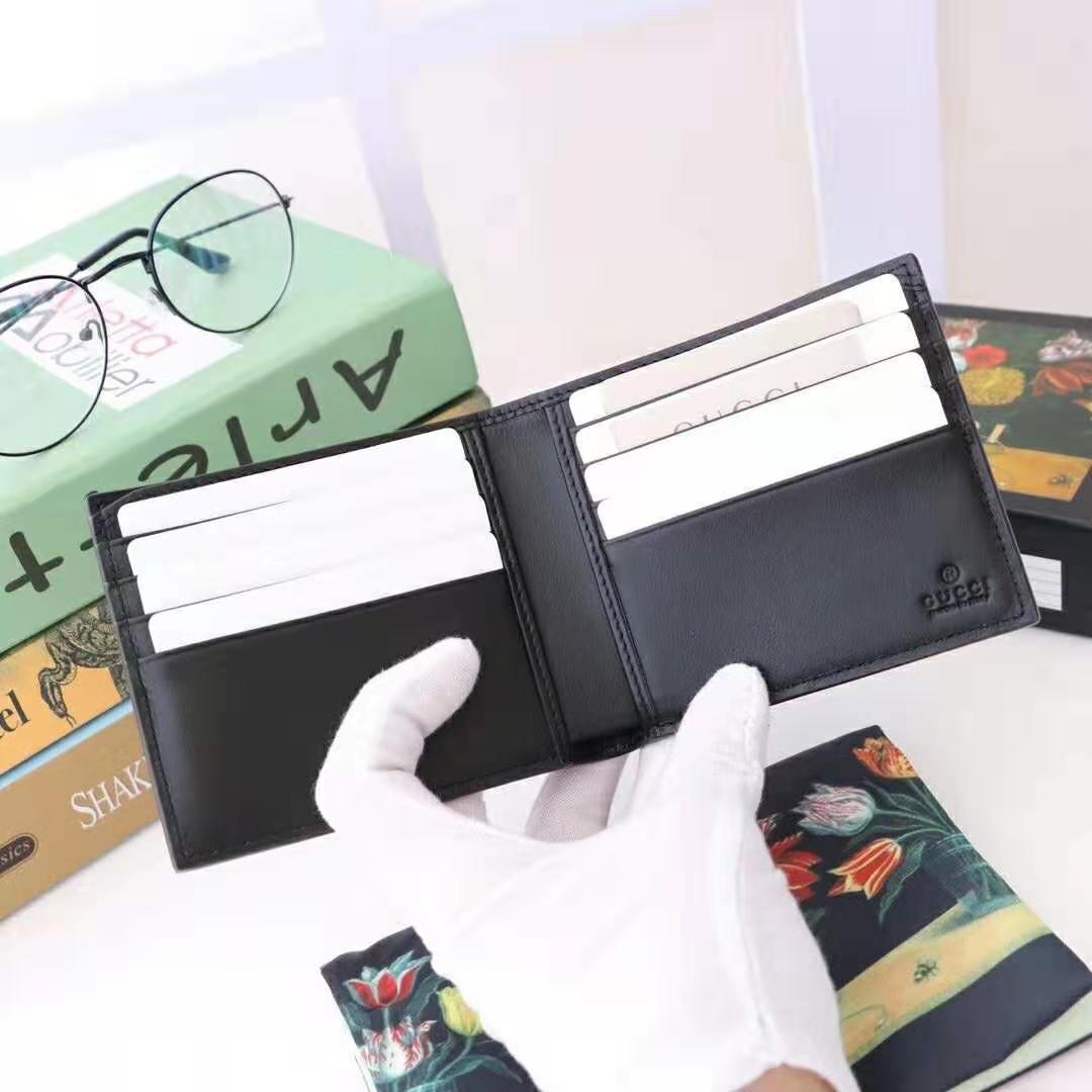 G*u*i gg unisex leather wallet with G*u*i logo in black leather