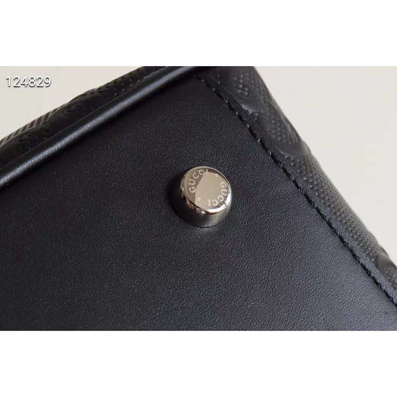 G*u*i gg unisex gg embossed duffle bag black embossed leather