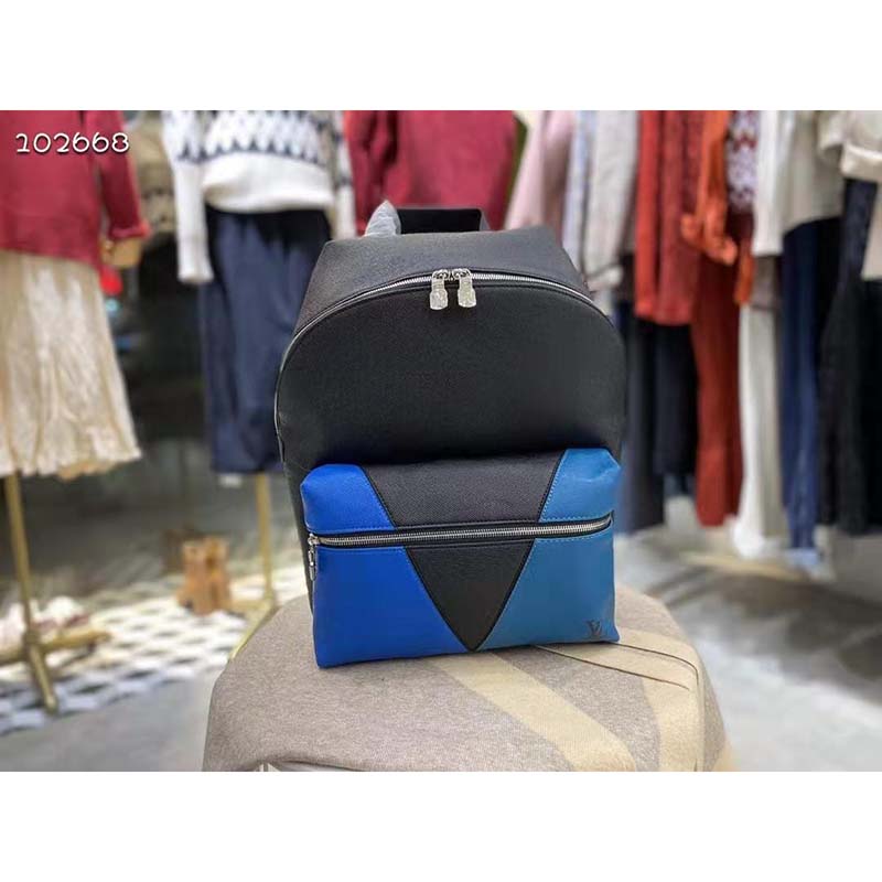 louis vuitton unisex discovery “v” logo backpack blue monoCh*0me taiga leather