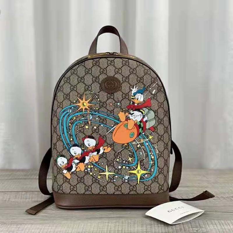 G*u*i unisex disney x G*u*i donald duck small backpack leather interlocking g