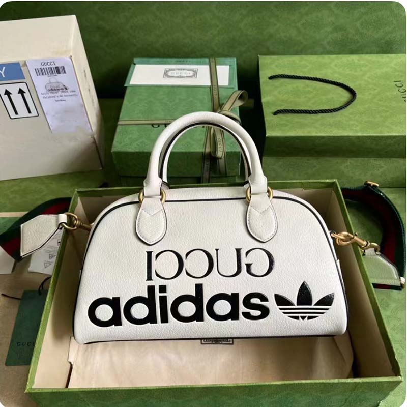 G*u*i unisex adidas x G*u*i mini duffle bag off-white leather interlocking g