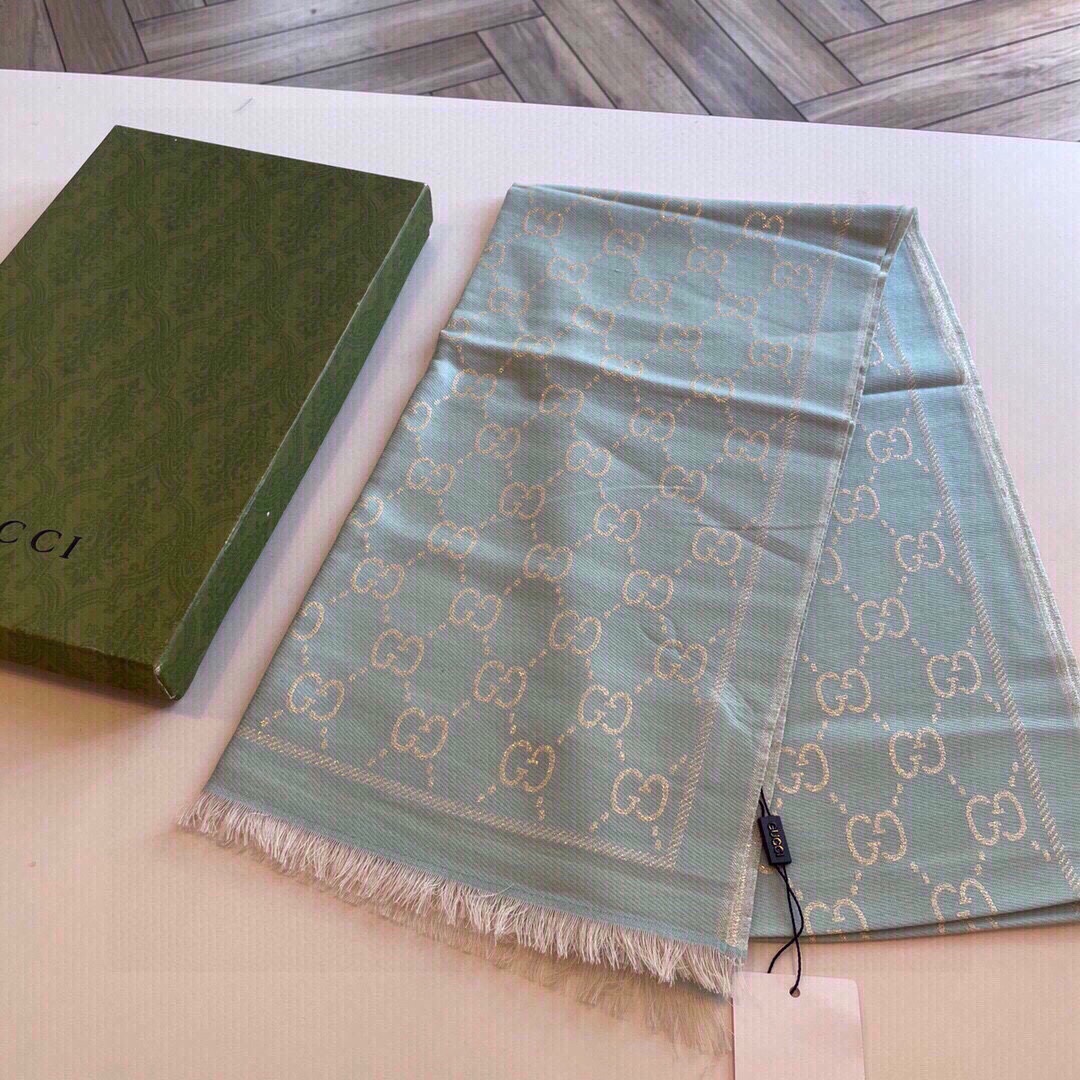 G*u*i unisex gg wool scarf beige mini gg wool turquoise tassel detail